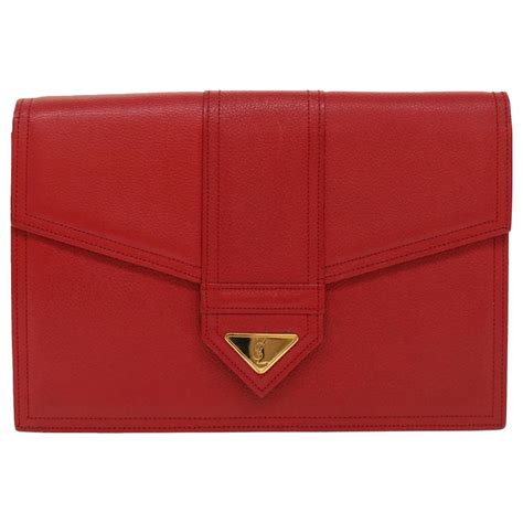 yves saint laurent clutch bag red|More.